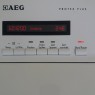 Стиральная машина AEG Protex Plus вертикальная загрузка